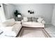 Cozy living room featuring tile floors, comfortable seating, and modern decorations at 4215 E Bay Dr # 1701C, Clearwater, FL 33764