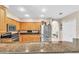 Modern kitchen featuring stainless steel appliances, granite countertops, and plenty of storage at 4266 Preserve Pl # 4266, Palm Harbor, FL 34685
