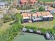 Aerial view of the back of the home featuring a dock, boat lift, and waterfront access at 4312 Sunray Ct # 36, Tampa, FL 33615