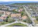 Stunning aerial view of waterfront townhome community with a marina, lush landscaping, and private docks at 4312 Sunray Ct # 36, Tampa, FL 33615