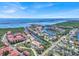Aerial view of the community featuring waterfront access, a bridge, and boats at 4312 Sunray Ct # 36, Tampa, FL 33615