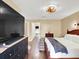 Comfortable main bedroom features neutral walls, ceiling fan, and lots of natural light at 4312 Sunray Ct # 36, Tampa, FL 33615