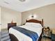 Cozy bedroom with hardwood floors and unique ceiling fan at 4312 Sunray Ct # 36, Tampa, FL 33615