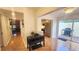 Bright entryway with a view to the kitchen featuring stainless steel appliances and an outdoor patio area at 4312 Sunray Ct # 36, Tampa, FL 33615