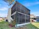 Rear exterior view showing the screened balcony, seamlessly extending the living space outdoors at 4312 Sunray Ct # 36, Tampa, FL 33615
