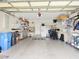 Two-car garage features epoxy floors and shelving to keep your belongings neat and tidy at 4312 Sunray Ct # 36, Tampa, FL 33615