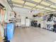 Spacious garage with overhead storage and room for multiple bikes and a workbench at 4312 Sunray Ct # 36, Tampa, FL 33615