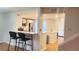 Open concept kitchen features a breakfast bar, modern appliances, and leads to a bright and airy living space at 4312 Sunray Ct # 36, Tampa, FL 33615