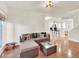 Bright living room featuring tile floors, modern furniture, and an open layout into the kitchen area at 4312 Sunray Ct # 36, Tampa, FL 33615