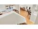 Upper-level view of the living room showcasing tile flooring, comfortable seating, and access to the backyard at 4312 Sunray Ct # 36, Tampa, FL 33615
