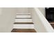 Classic staircase with white risers and wood treads, seamlessly connecting different levels of the home at 4312 Sunray Ct # 36, Tampa, FL 33615