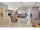 Comfortable living area with large sofa, sliding glass doors, and a view of the patio at 4411 Culbreath Rd, Valrico, FL 33596