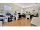 Spacious office area featuring multiple desks and workstations with great natural light at 4411 Culbreath Rd, Valrico, FL 33596