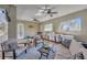 Comfortable outdoor kitchen and entertainment area with seating and stainless steel appliances at 4411 Culbreath Rd, Valrico, FL 33596
