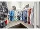 Organized walk-in closet with ample hanging space and shelving for storage at 4411 Culbreath Rd, Valrico, FL 33596