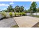Large backyard with mature trees, concrete pad and lush landscaping, perfect for outdoor enjoyment at 4500 22Nd S Ave, St Petersburg, FL 33711