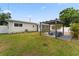 Beautiful backyard featuring a modern patio with stylish furniture and lush landscaping at 4500 22Nd S Ave, St Petersburg, FL 33711