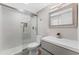 Modern bathroom featuring a glass shower, sleek vanity, and neutral color palette at 4500 22Nd S Ave, St Petersburg, FL 33711