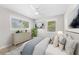 Cozy bedroom with natural light, a comfortable bed, and tasteful decor, creating a relaxing retreat at 4500 22Nd S Ave, St Petersburg, FL 33711