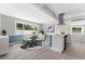 Bright dining area with modern lighting, stylish table, and ample natural light at 4500 22Nd S Ave, St Petersburg, FL 33711