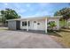 Charming home featuring great curb appeal, a well-manicured lawn, and a welcoming entrance at 4500 22Nd S Ave, St Petersburg, FL 33711
