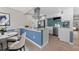 Bright kitchen featuring modern appliances, a breakfast bar, and sleek finishes for a contemporary cooking experience at 4500 22Nd S Ave, St Petersburg, FL 33711