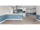 Open-concept kitchen featuring modern appliances, island, and tile backsplash at 4500 22Nd S Ave, St Petersburg, FL 33711