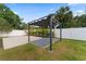 The backyard features a concrete pad and pergola offering an inviting outdoor space at 4500 22Nd S Ave, St Petersburg, FL 33711