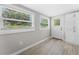 Bright, versatile room with built-in cabinets, a view of the yard, and natural light at 4500 22Nd S Ave, St Petersburg, FL 33711