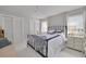 Cozy bedroom with white trim, a ceiling fan, neutral walls, and a bed with dark wood frame at 4959 58Th S Ave, St Petersburg, FL 33715