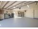 Spacious garage with epoxy flooring and plenty of storage space at 4959 58Th S Ave, St Petersburg, FL 33715
