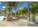 Relaxing hammock area with water views, creating a tranquil space for rest and enjoying waterfront living at 4959 58Th S Ave, St Petersburg, FL 33715