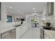 Bright kitchen with modern appliances, and a view of a dining area at 4959 58Th S Ave, St Petersburg, FL 33715