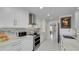 Bright kitchen with modern appliances and marble countertops at 4959 58Th S Ave, St Petersburg, FL 33715