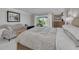 Spacious main bedroom with balcony access overlooking the pool at 4959 58Th S Ave, St Petersburg, FL 33715
