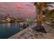 Waterfront patio with cozy seating area and scenic views of the tranquil waterway at 4959 58Th S Ave, St Petersburg, FL 33715