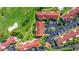 Beautiful aerial shot shows meticulous landscaping and manicured grounds near the golf course and parking area at 6059 Bahia Del Mar Blvd # 134, St Petersburg, FL 33715