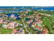 Stunning aerial view of the community near the water, showing meticulous landscaping, ponds, and convenient parking at 6059 Bahia Del Mar Blvd # 134, St Petersburg, FL 33715