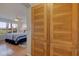 Cozy bedroom with golf course view and ample storage with wood grain cabinets at 6059 Bahia Del Mar Blvd # 134, St Petersburg, FL 33715