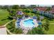 Beautiful community pool area with lush landscaping and plenty of lounge chairs at 6059 Bahia Del Mar Blvd # 134, St Petersburg, FL 33715