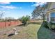 The backyard has a bird bath, mature landscaping, and a privacy fence at 8137 Greenside Ln, Hudson, FL 34667