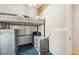 Bedroom with blue carpet, loft bed and unpainted drywall at 8137 Greenside Ln, Hudson, FL 34667