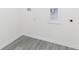 Laundry room with LVP flooring at 9510 Xenia St, New Port Richey, FL 34654