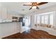 Inviting eat-in kitchen featuring a breakfast bar, modern appliances, and a cozy window bench at 10610 Lakeside Vista Dr, Riverview, FL 33569