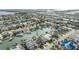 Aerial view of waterfront homes nestled along canals, each featuring private docks perfect for boating and waterfront living at 116 9Th E St, Tierra Verde, FL 33715
