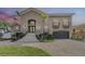 Elegant two-story home with lush landscaping, grand entrance, and a two-car garage at 116 9Th E St, Tierra Verde, FL 33715