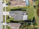 Aerial view of a well-maintained home with a spacious backyard, showing its position in a quiet residential neighborhood at 1224 Cressford Pl, Brandon, FL 33511