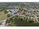 Aerial image of a lakeside home, near a school in a Primary-planned community, offering convenience and charm at 1224 Cressford Pl, Brandon, FL 33511