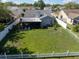 The backyard features a fenced yard and lanai, creating a private space for relaxation and recreation at 1224 Cressford Pl, Brandon, FL 33511
