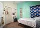 Comfortable bedroom featuring a twin bed, closet, and cozy decor at 1224 Cressford Pl, Brandon, FL 33511